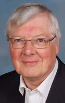 man in glasses and collar and tie