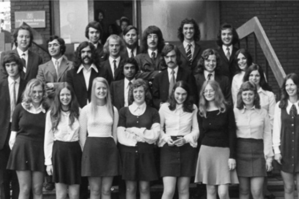 Black and white photo of students posing on the steps of the Life Sciences building