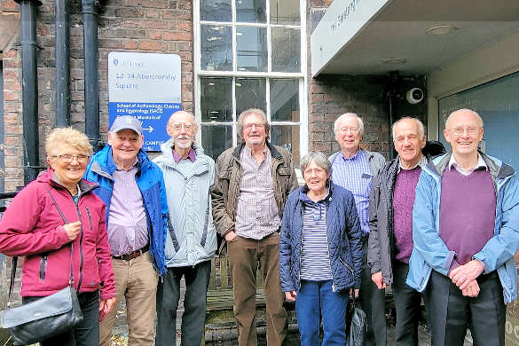 Group photo of alumni in front of the Garstang Museum's entrance