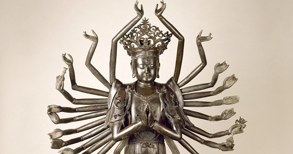 Statue of Hindu God with many arms.