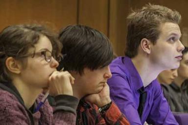 Students listening in a lecture hall