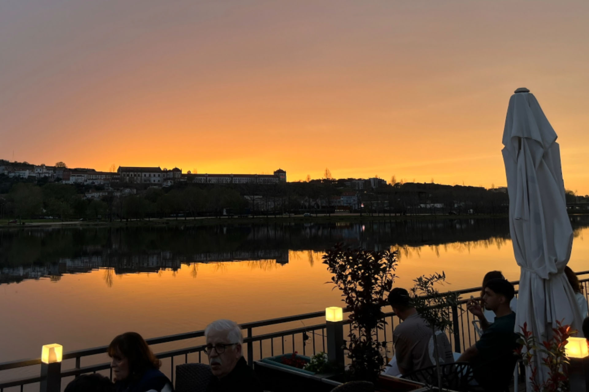 A sunset view in the city of Coimbra in Portugal, overlooking the riverside