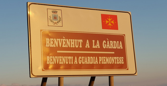 road sign with two italian phrases