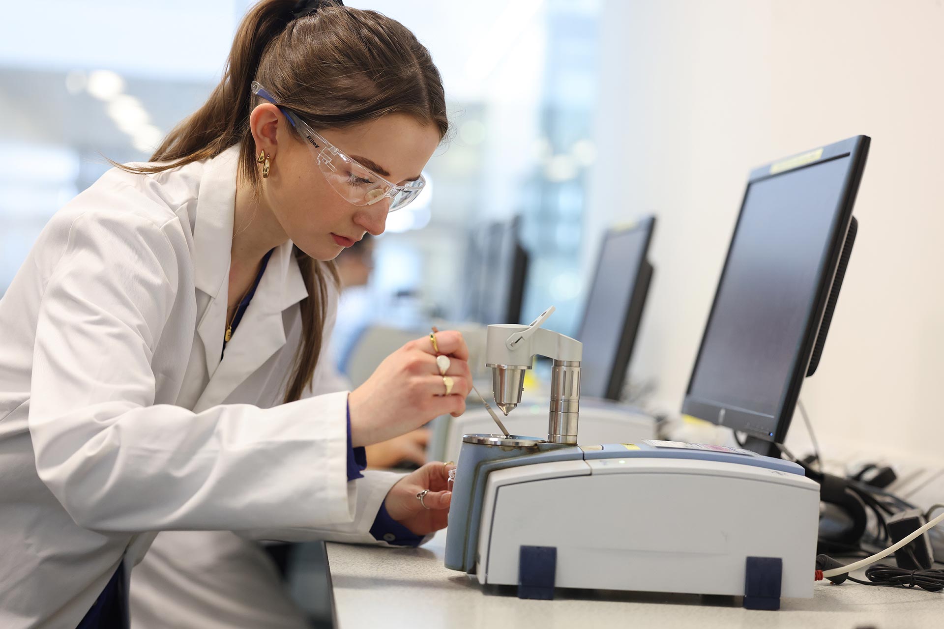 PhD student carrying out an experiment in one of the labs at the University of Liverpool