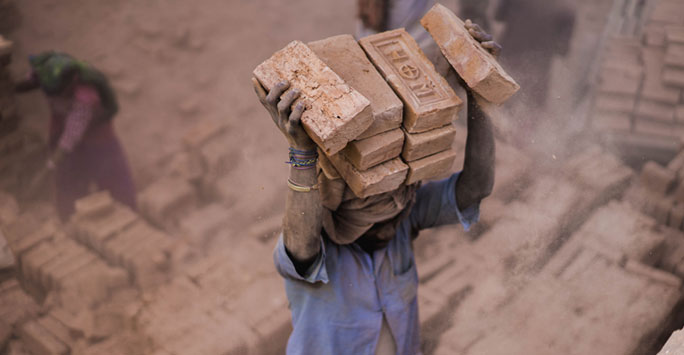 Man carrying heavy load