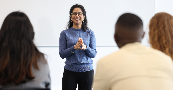 Student presenting in front of the class