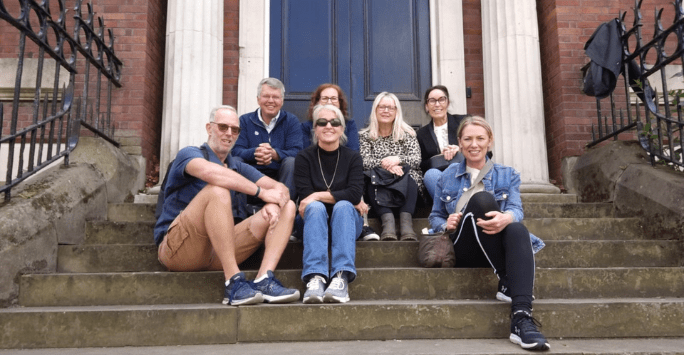 group of friends on steps