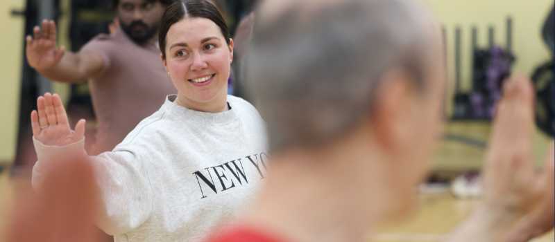 Staff members taking part in a group exercise class