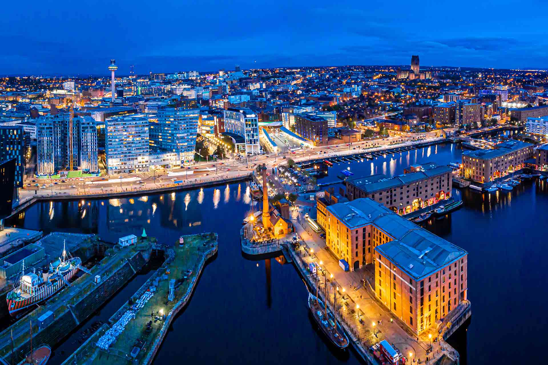 The Albert Dock and Liverpool city skyline at dusk