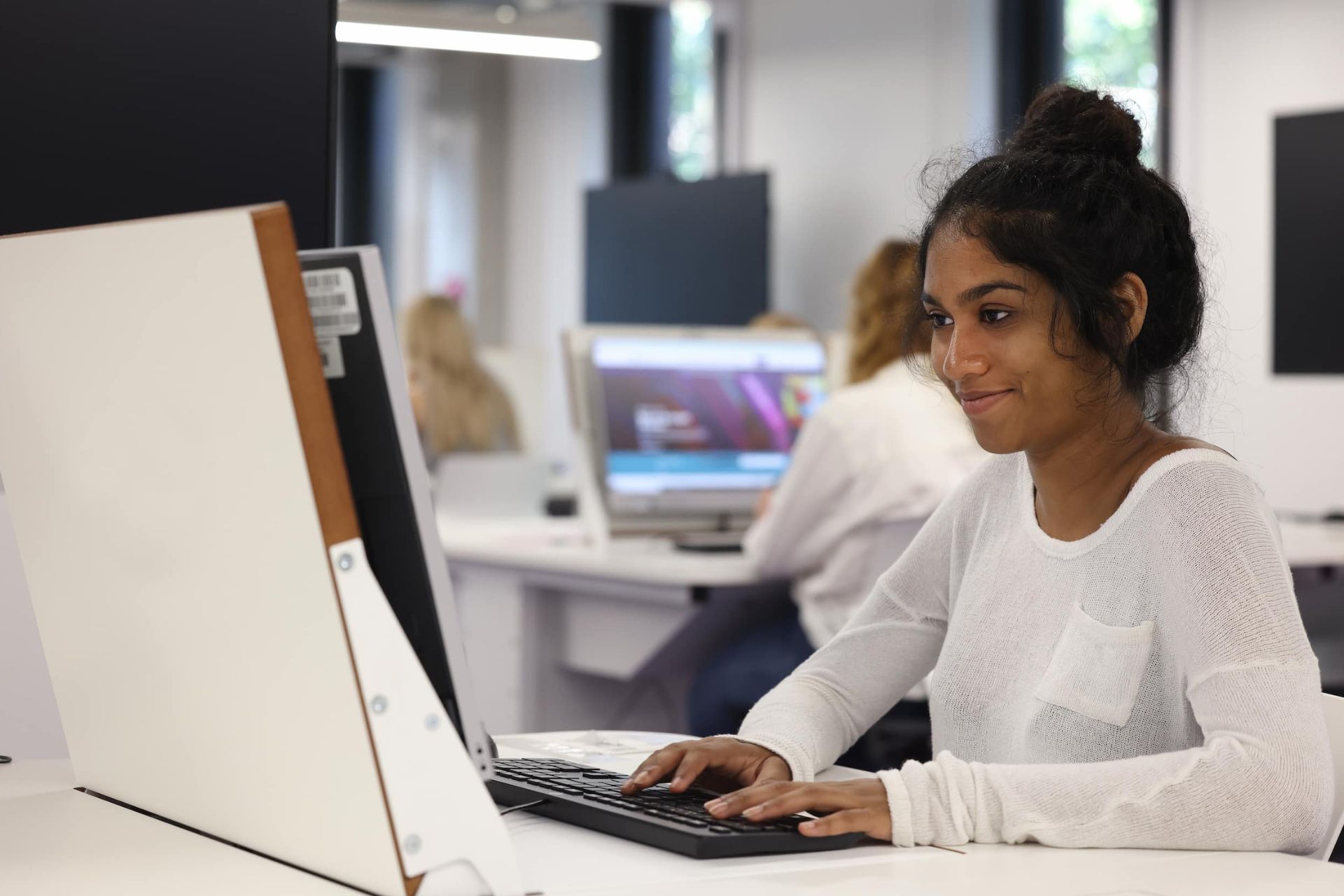 Student sitting at computer